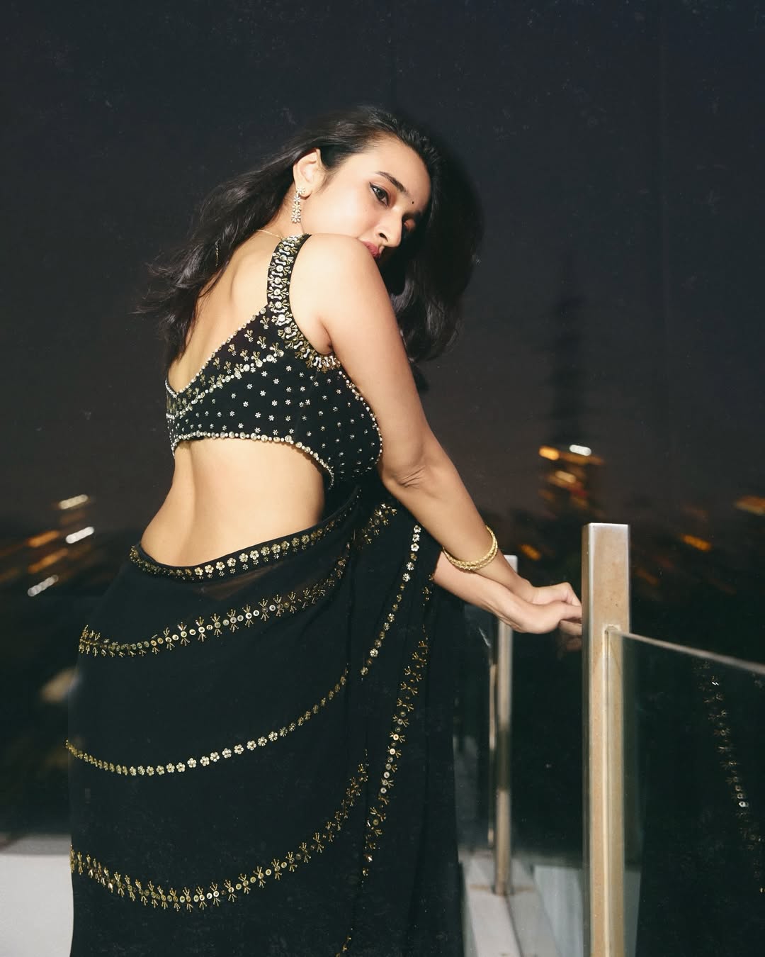 Nuveksha Shows Off Her Toned Back In A Bold Blouse