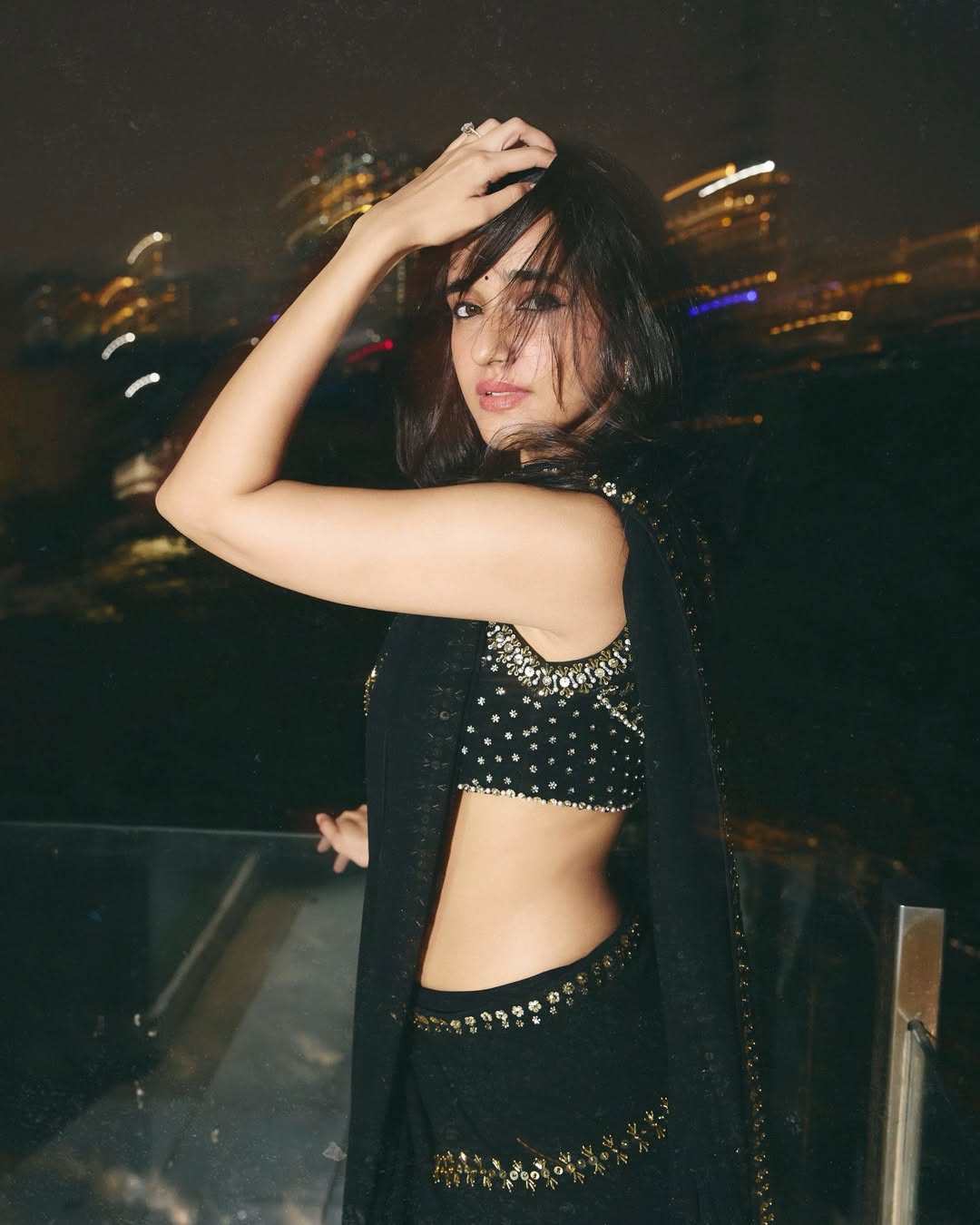 Nuveksha Shows Off Her Toned Back In A Bold Blouse