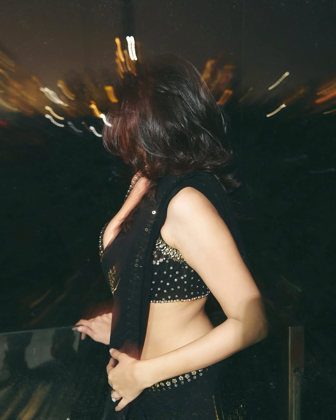 Nuveksha's Sizzling Hot Look In A Backless Saree