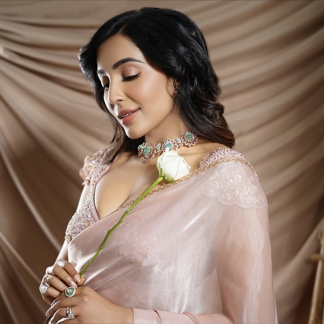 The Actress Looks Down, Holding A White Rose