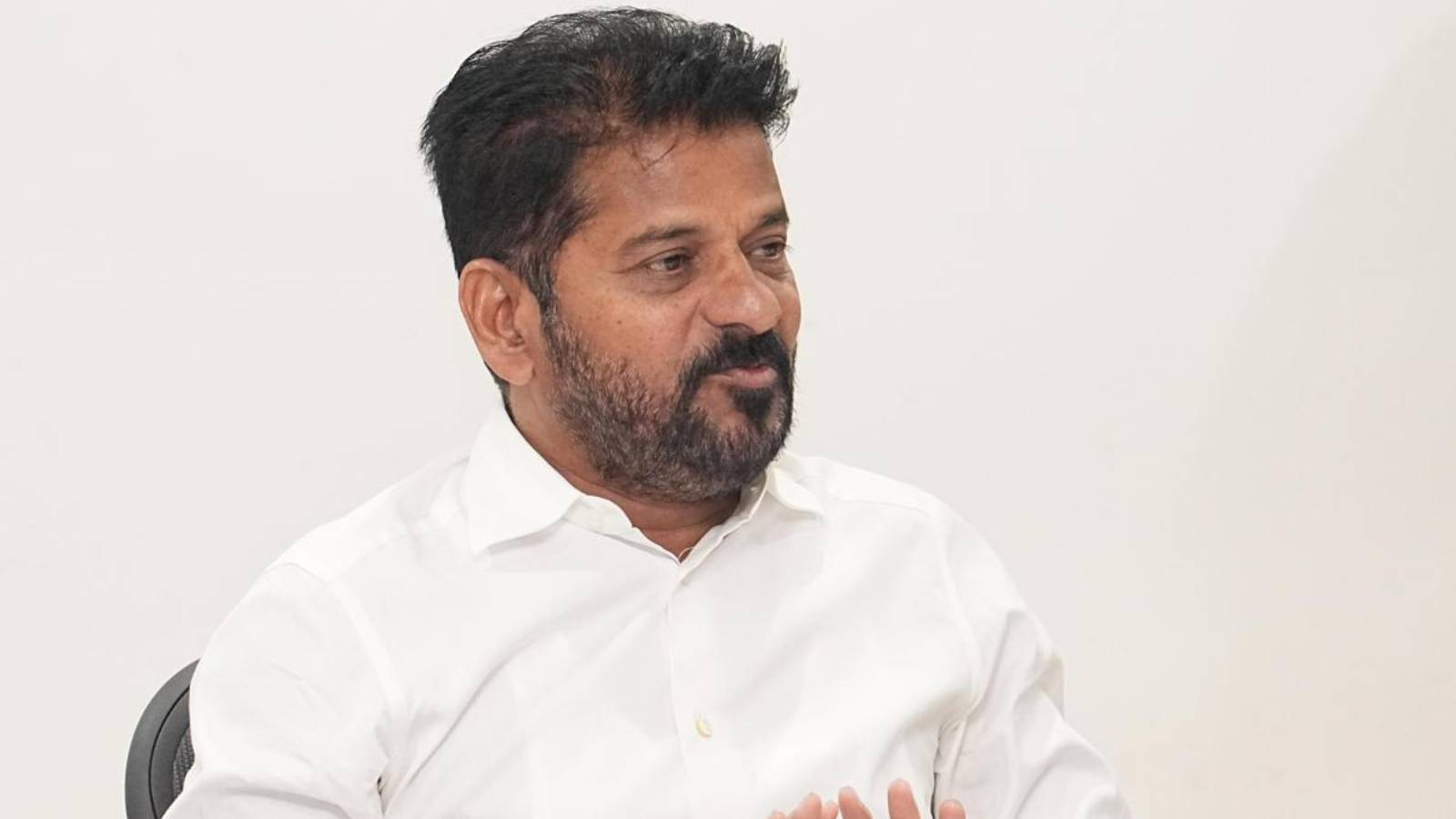 Revanth Reddy addressing media after bypoll