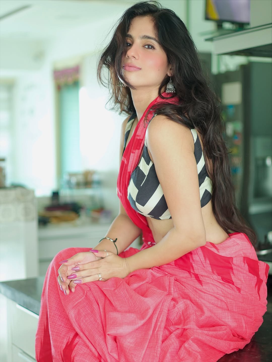 Rose Sardana's Chevron Blouse And Pink Saree