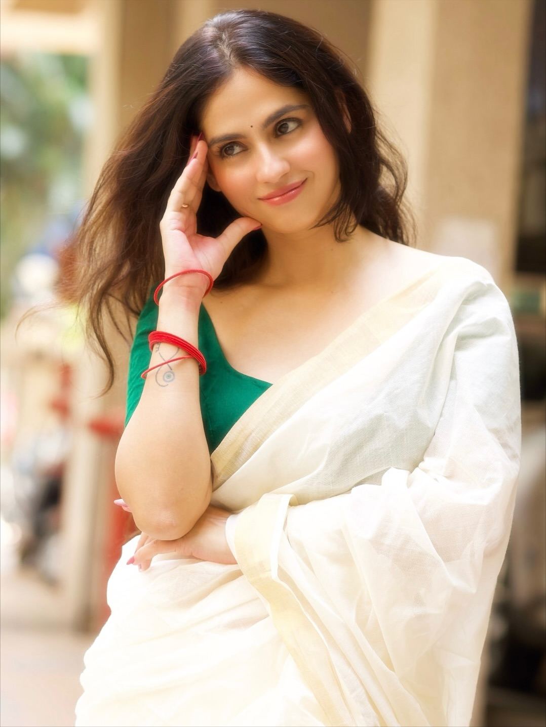 Rose Sardana's Radiant Smile In A White Saree