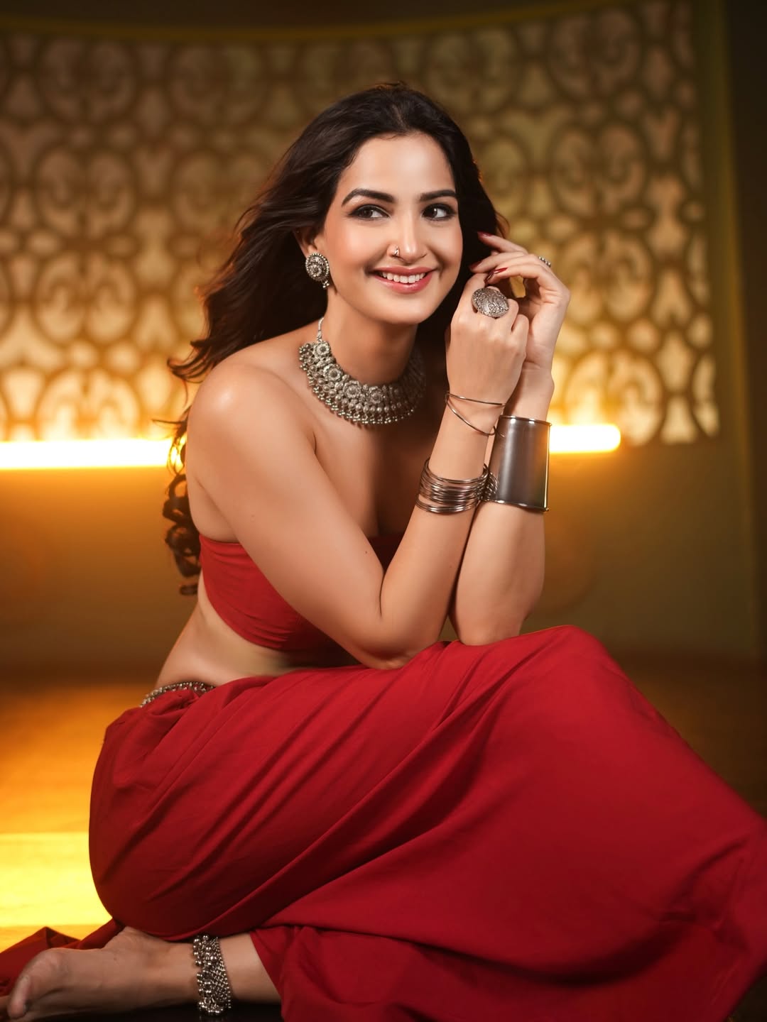 Shubhi Joshi Poses In A Red Bandeau Top & Skirt