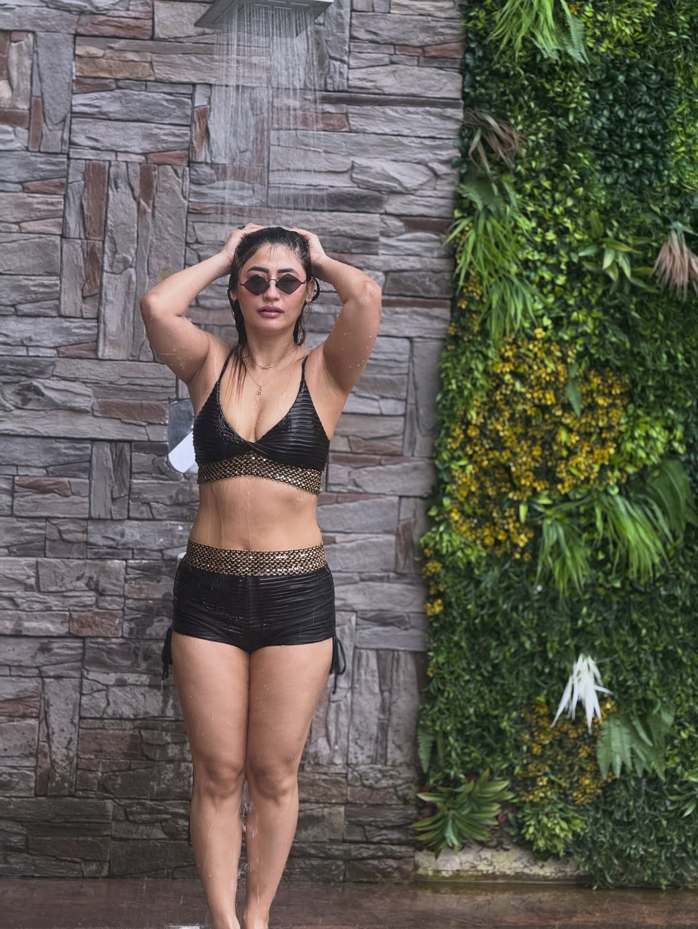 Sunita Gogoi Black Resort Wear With Wet Hair Style