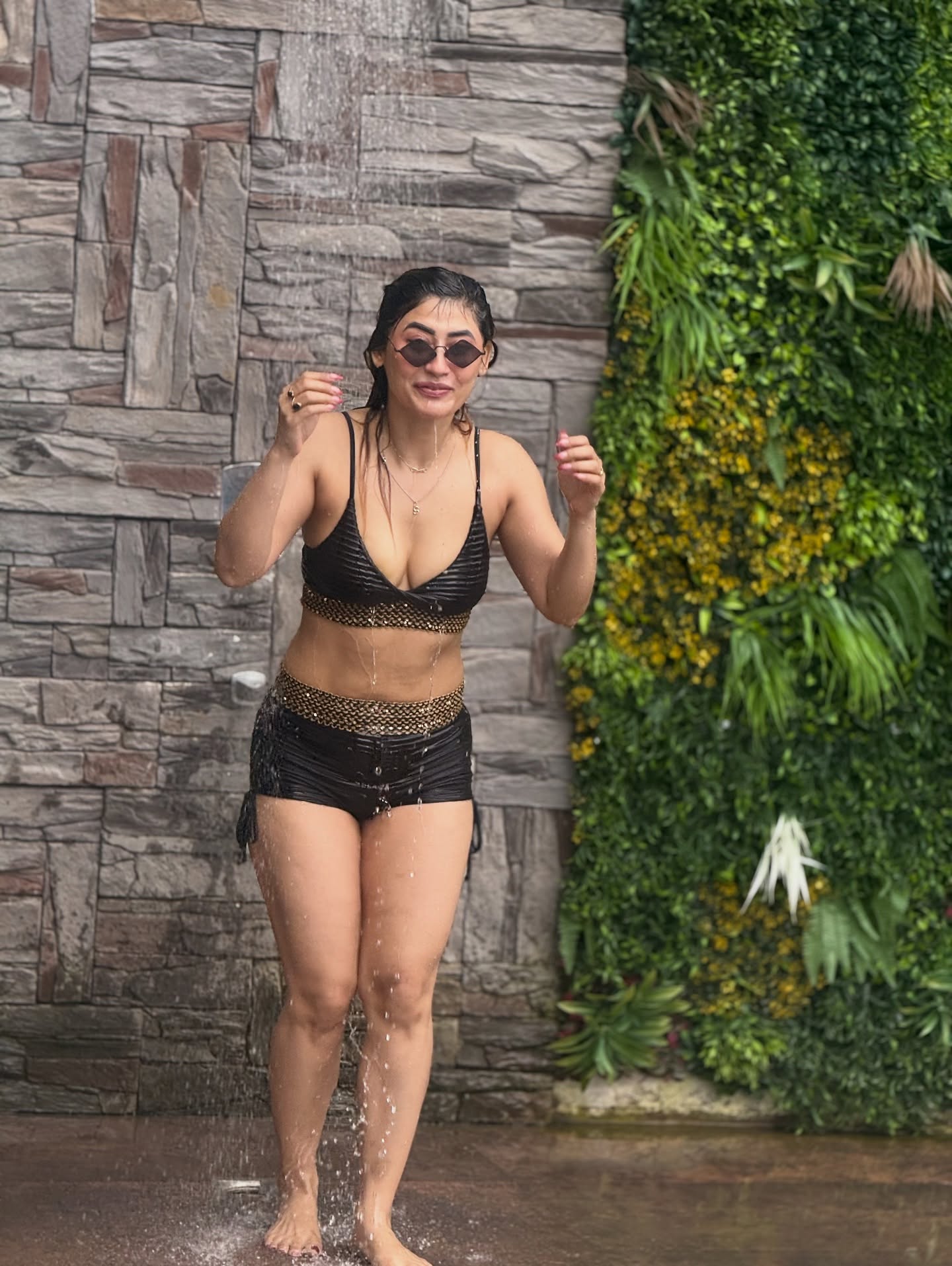 Sunita Gogoi In Bold Black Swimwear By Waterfall
