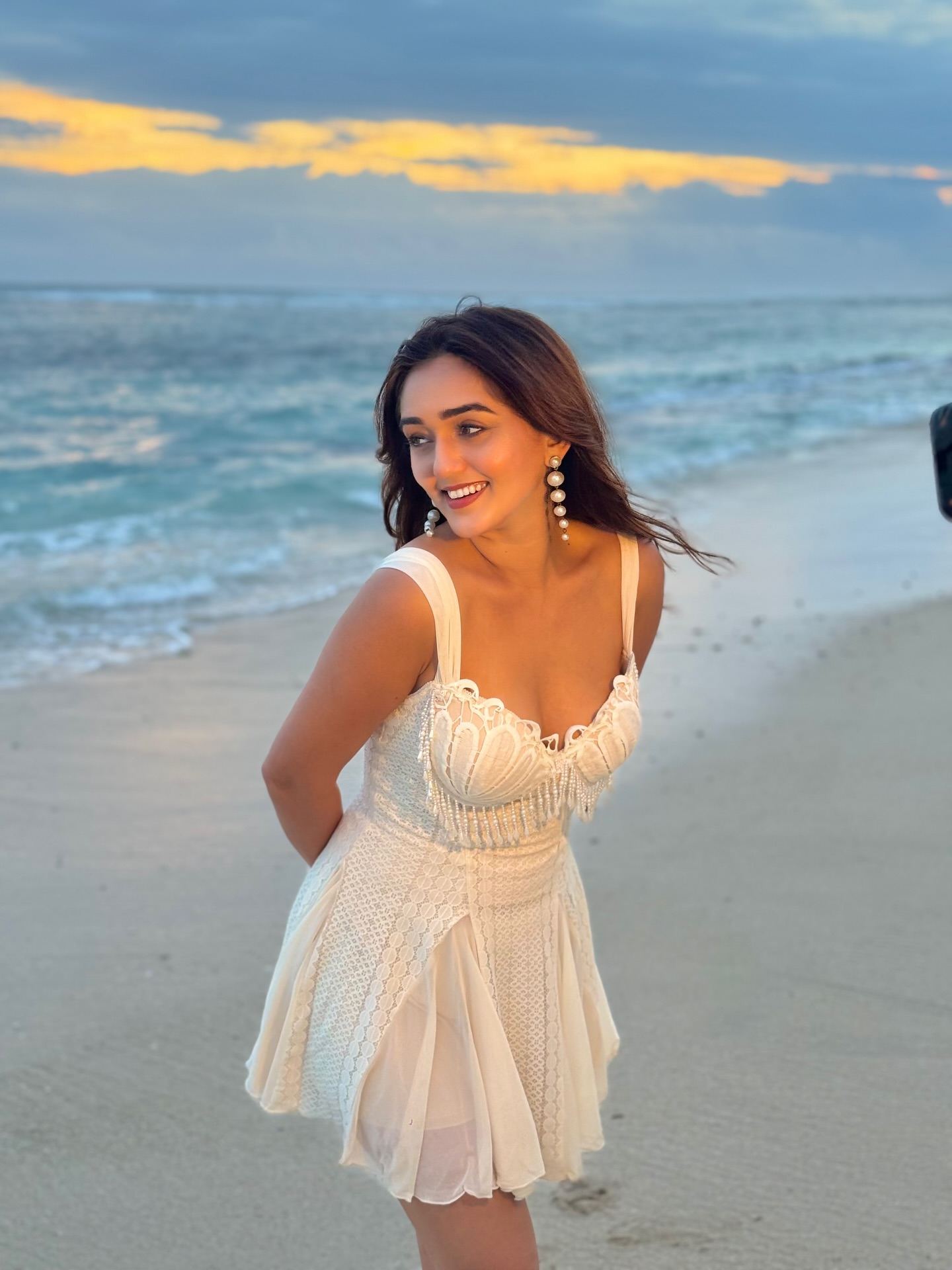 Tanya Sharma Smiling In Coastal Golden Light
