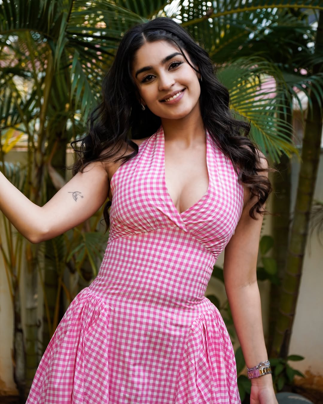 The Actress Twirls In Her Pink Gingham Dress