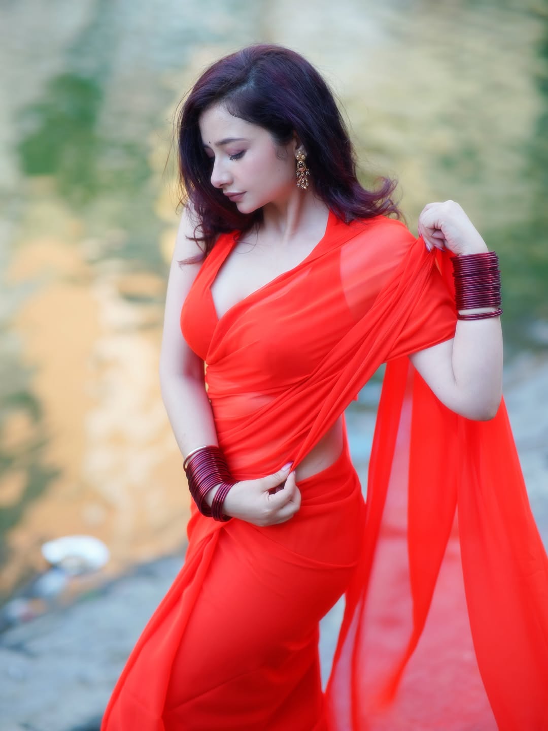 Amrita Mishra Poses In Vibrant Red Saree Visual