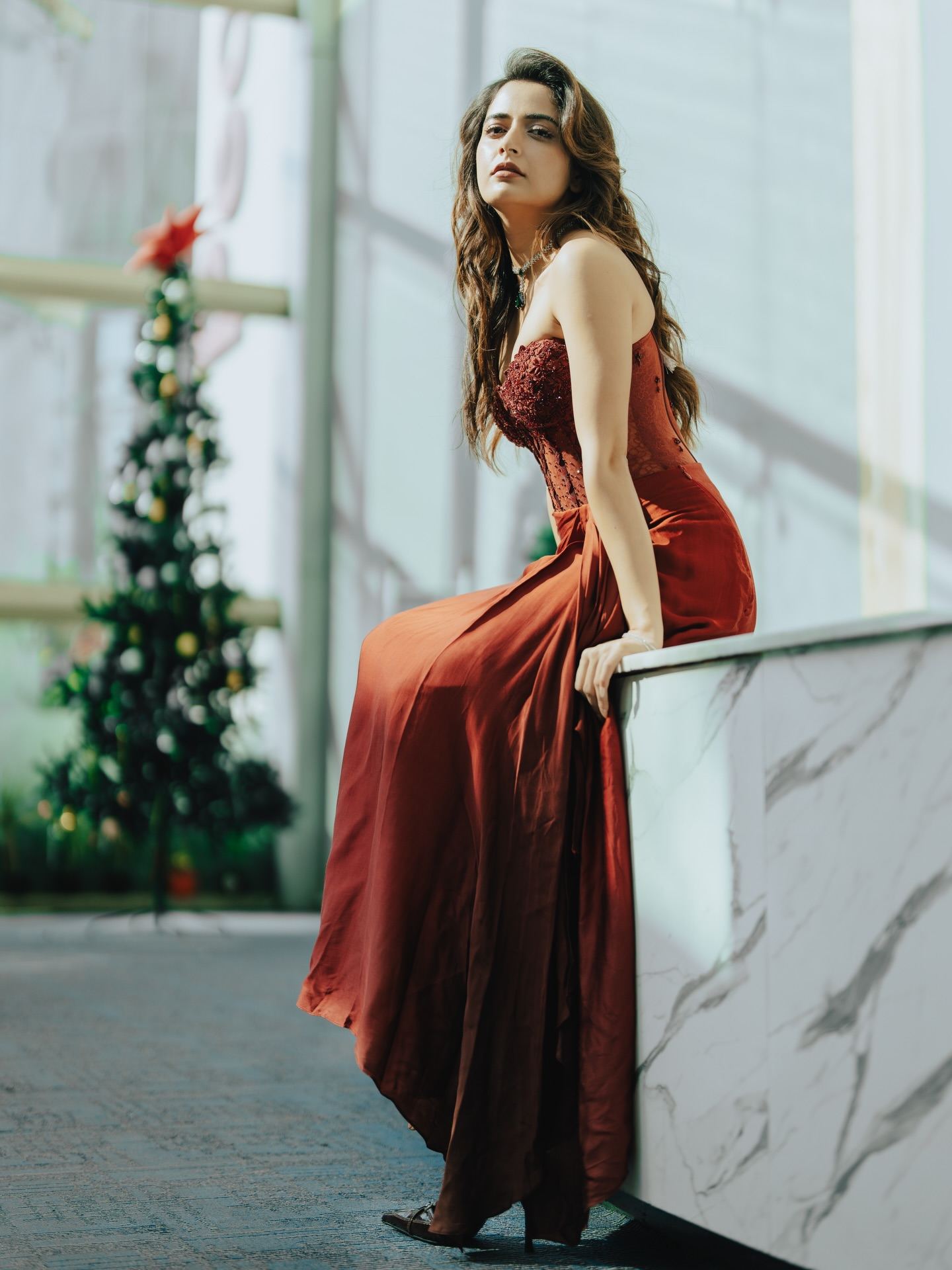 Ashika Ranganath glamorous red gown look