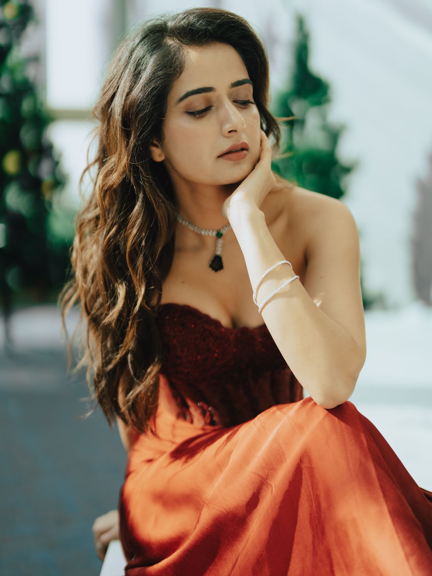 Ashika Ranganath red gown indoor photos