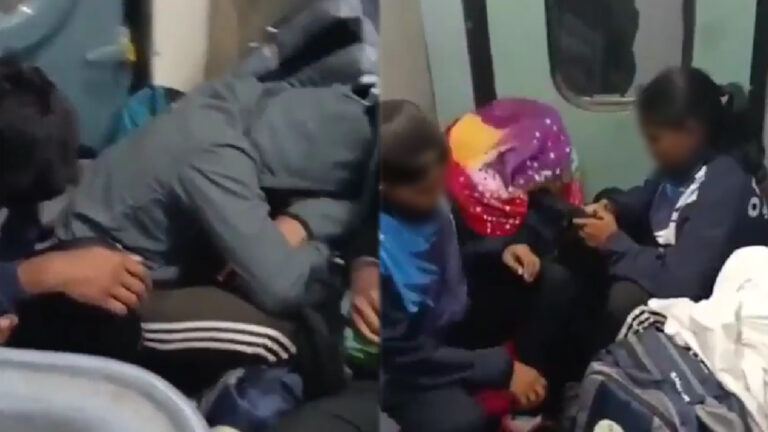 Athletes sitting near train toilet area