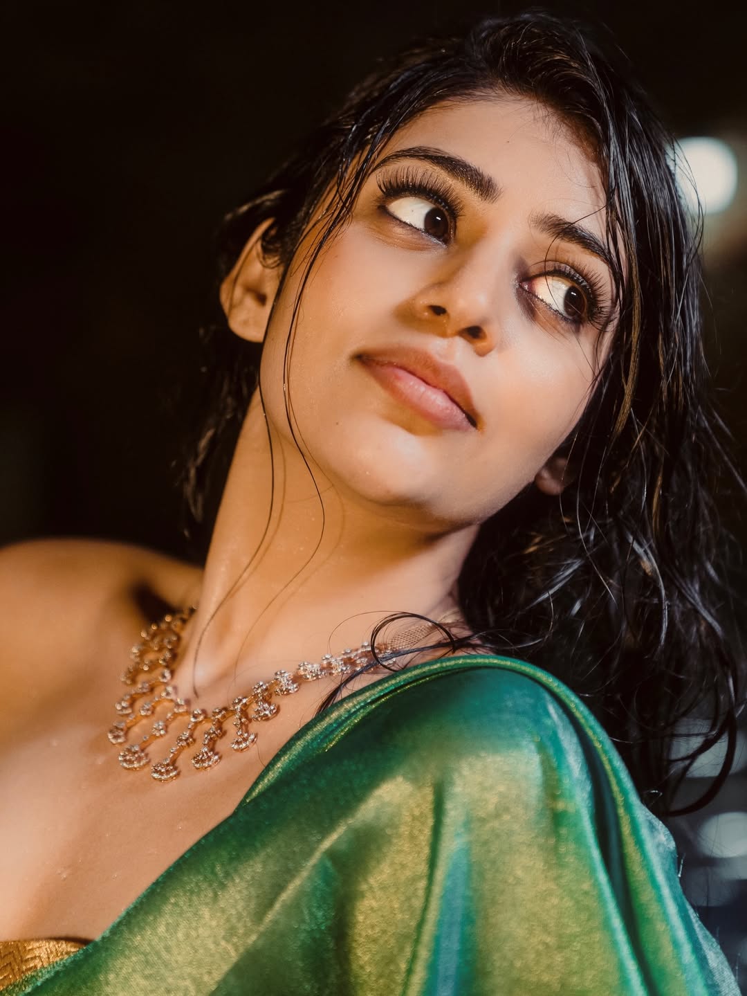 Bandhavi Sridhar Stuns In Wet Green Saree Photo