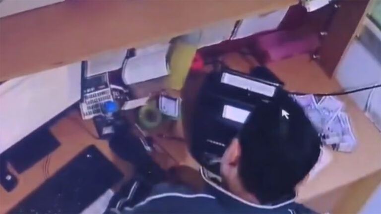 Bank cashier caught stealing money on CCTV