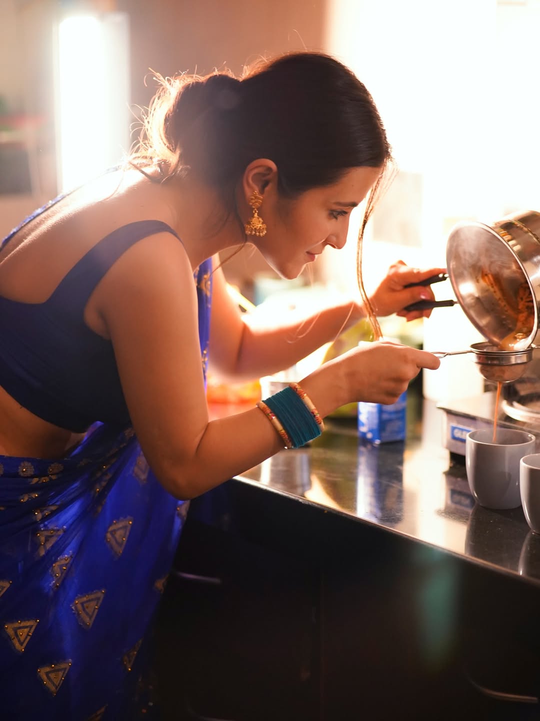 Binita Budathoki Making Tea In Blue Saree