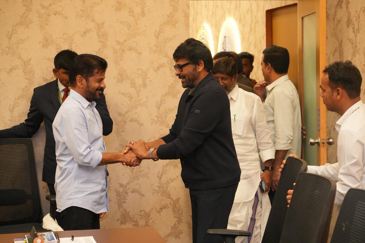 Chiranjeevi And CM Sharing Light Hearted Moments