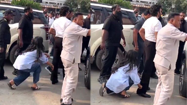 Dhanush stylist adjusts outfit at event