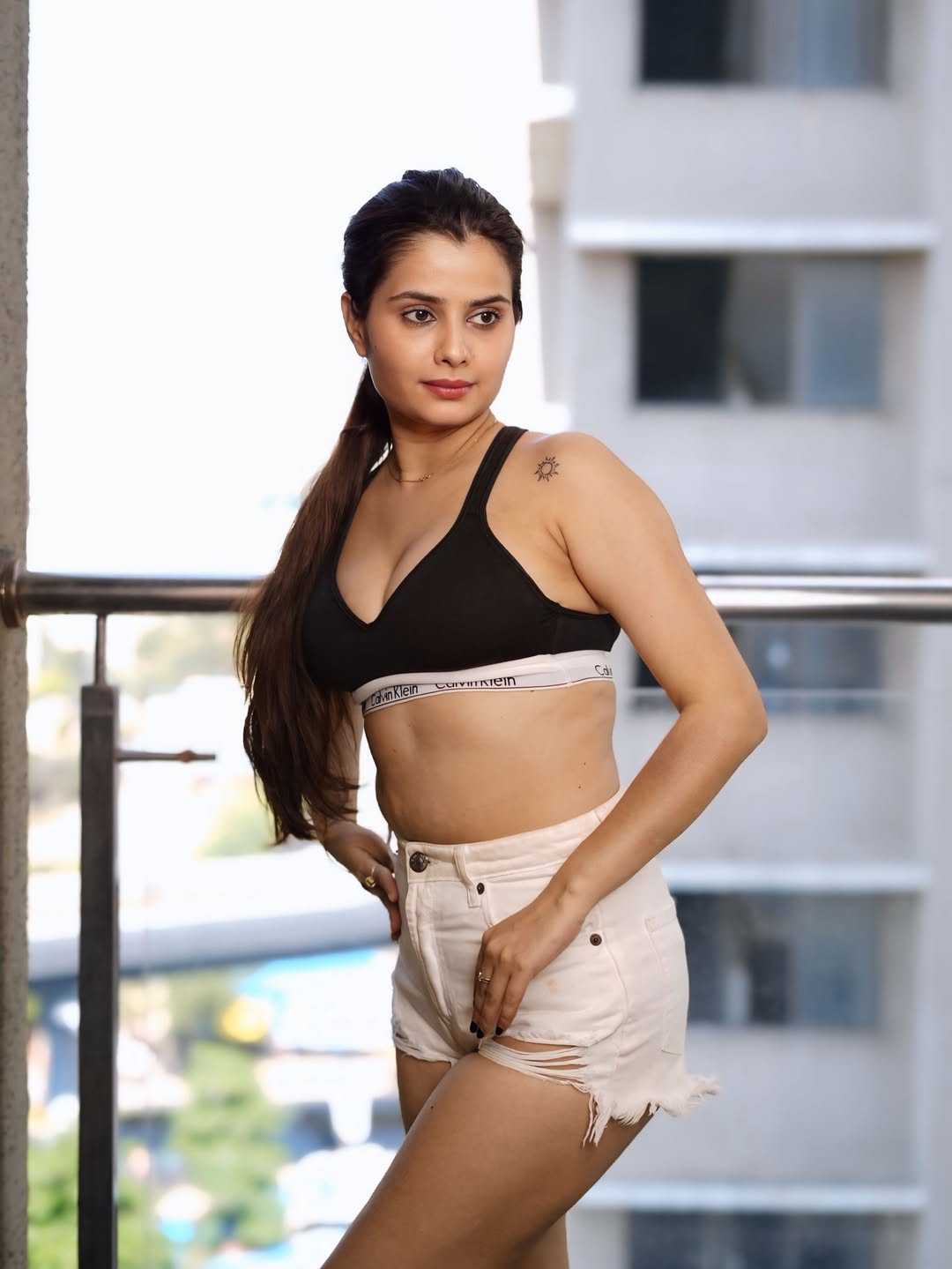 The Actress Flaunts Her Toned Midriff In Shorts