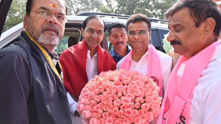 KCR Assembly visit handshake moment