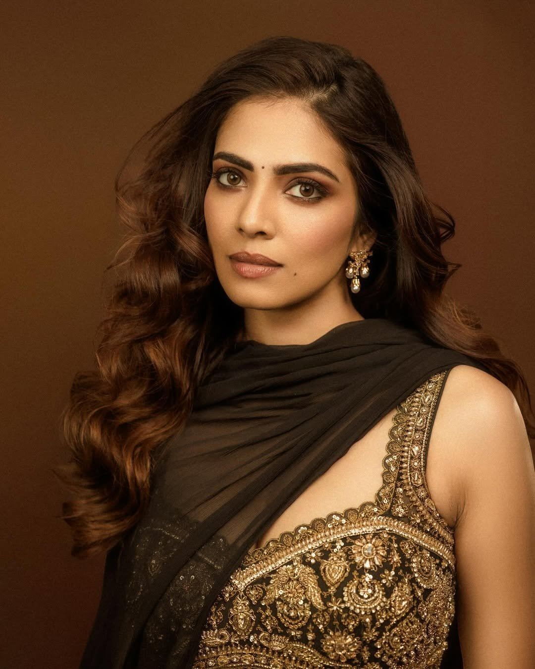 Malavika Mohanan Stuns In Heavy Gold Work Look