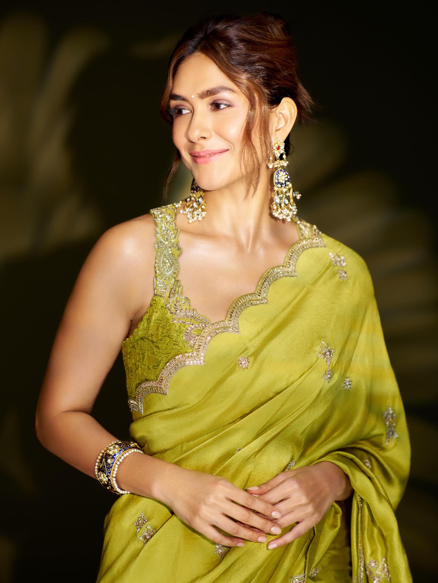 Mrunal Thakur's Regal Look In A Green Silk Saree