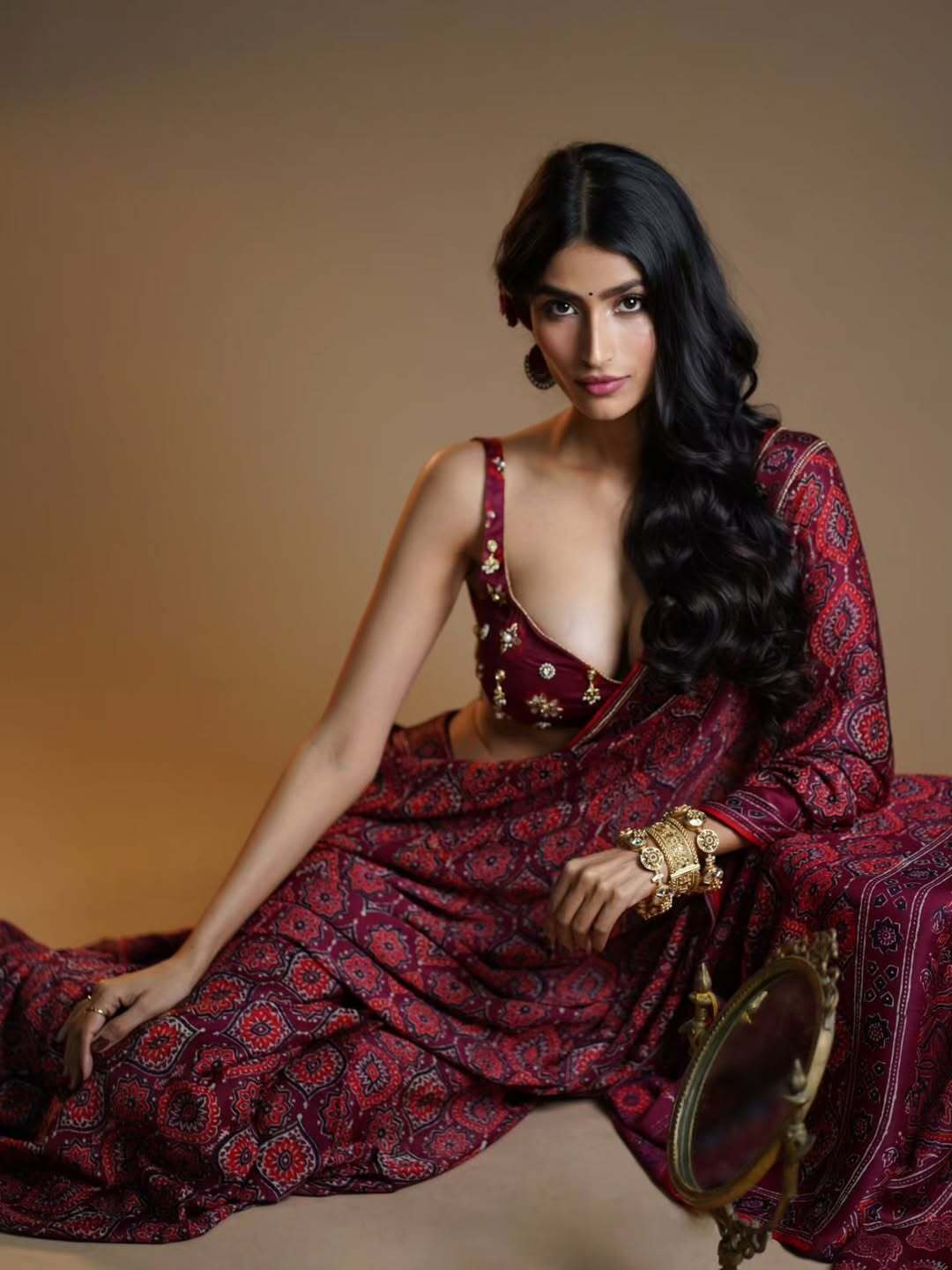 Neikitha Shows Side Profile With Rose Bun