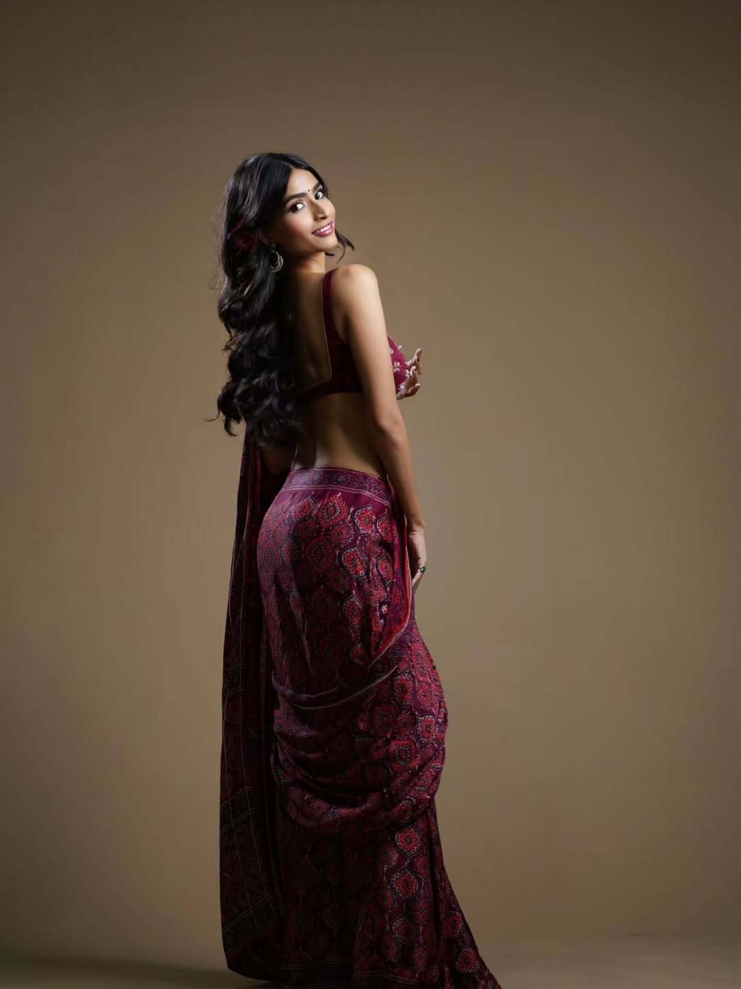 Neikitha Flaunts Back In Trendy Saree Style