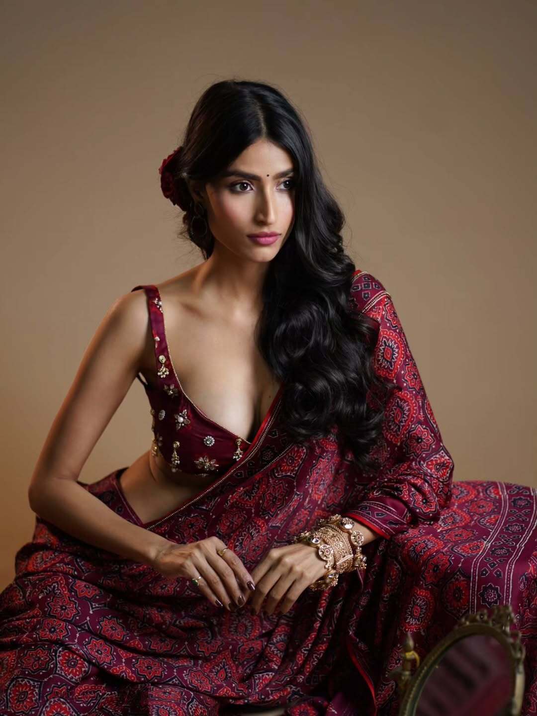 Neikitha Shows Side Profile With Rose Bun