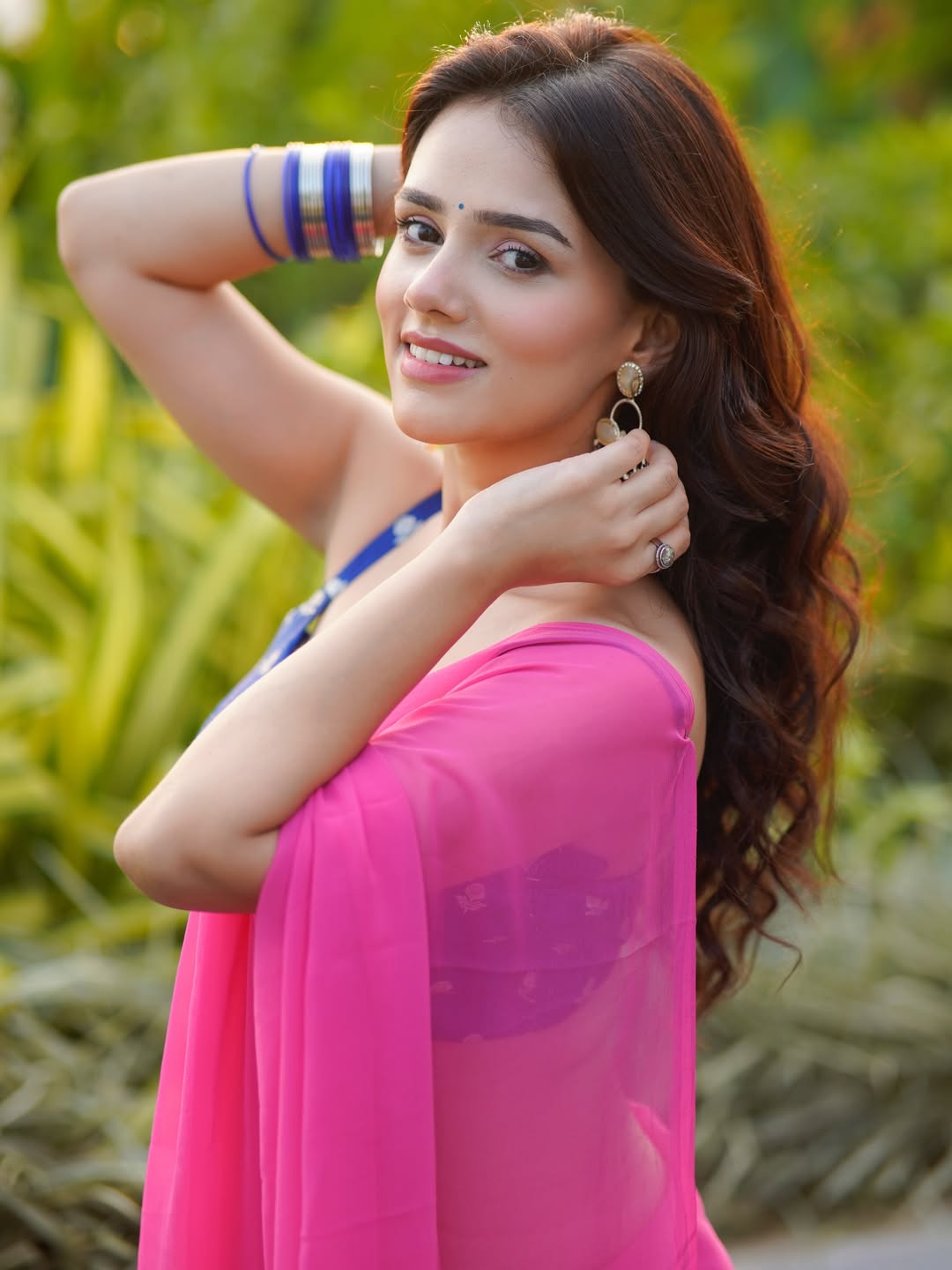 Nishi Saxena's Radiant Smile In Pink Saree Look.