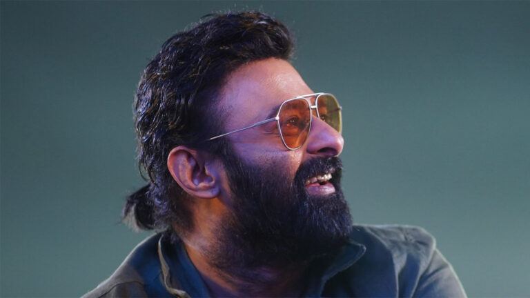 Prabhas sharp new look at Raja Saab event