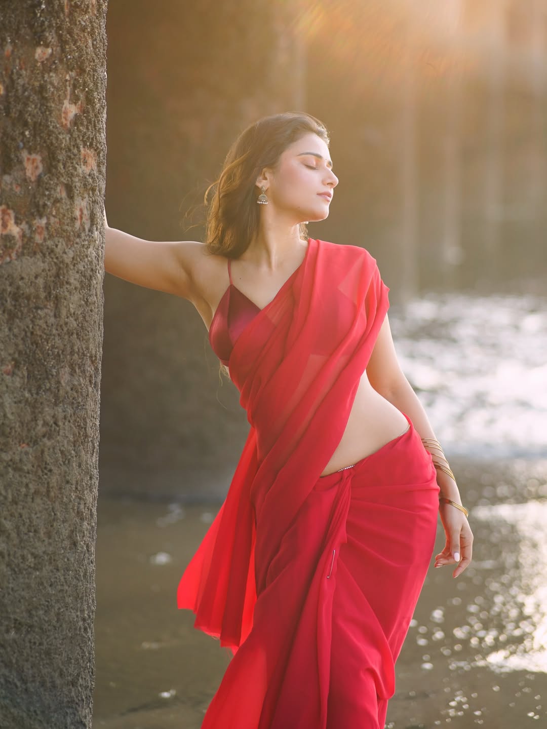 Prisha Singh Breezy Hair In Red Saree Photo Look