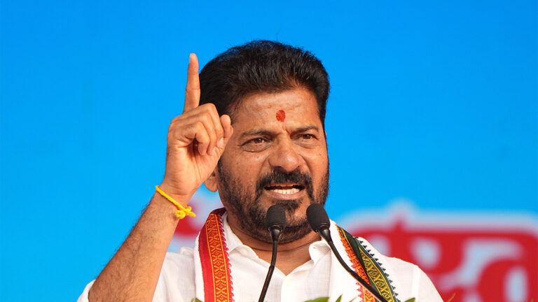 Revanth Reddy with grandson at Messi event