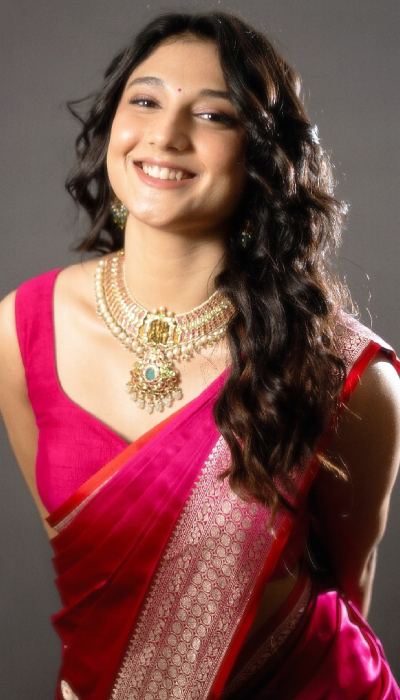 Ritika Nayak Stuns In Hot Pink Saree With Desi Charm