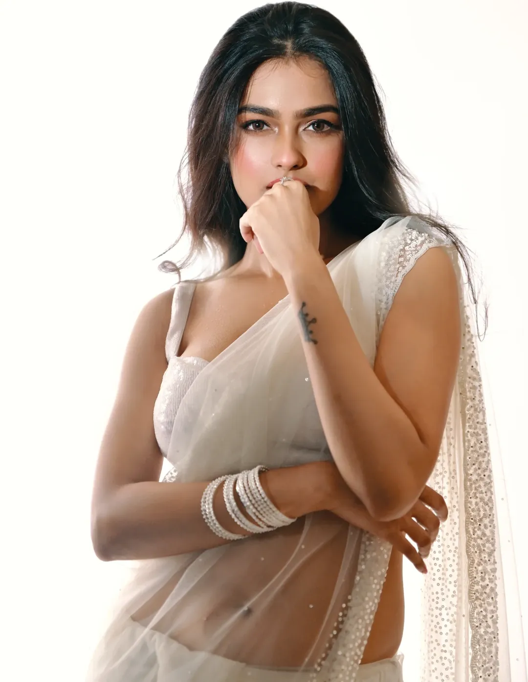 Riya Banik Gazes Softly With White Bangles On
