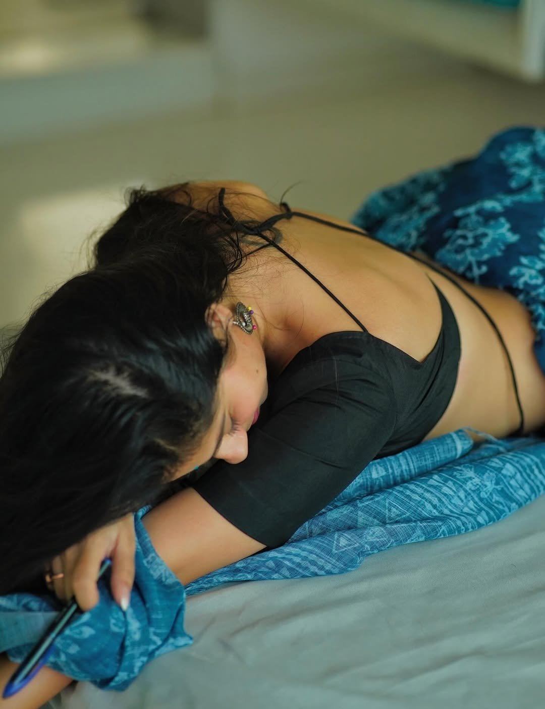 Rose Sardana's Bold Pose Looking Over Shoulder