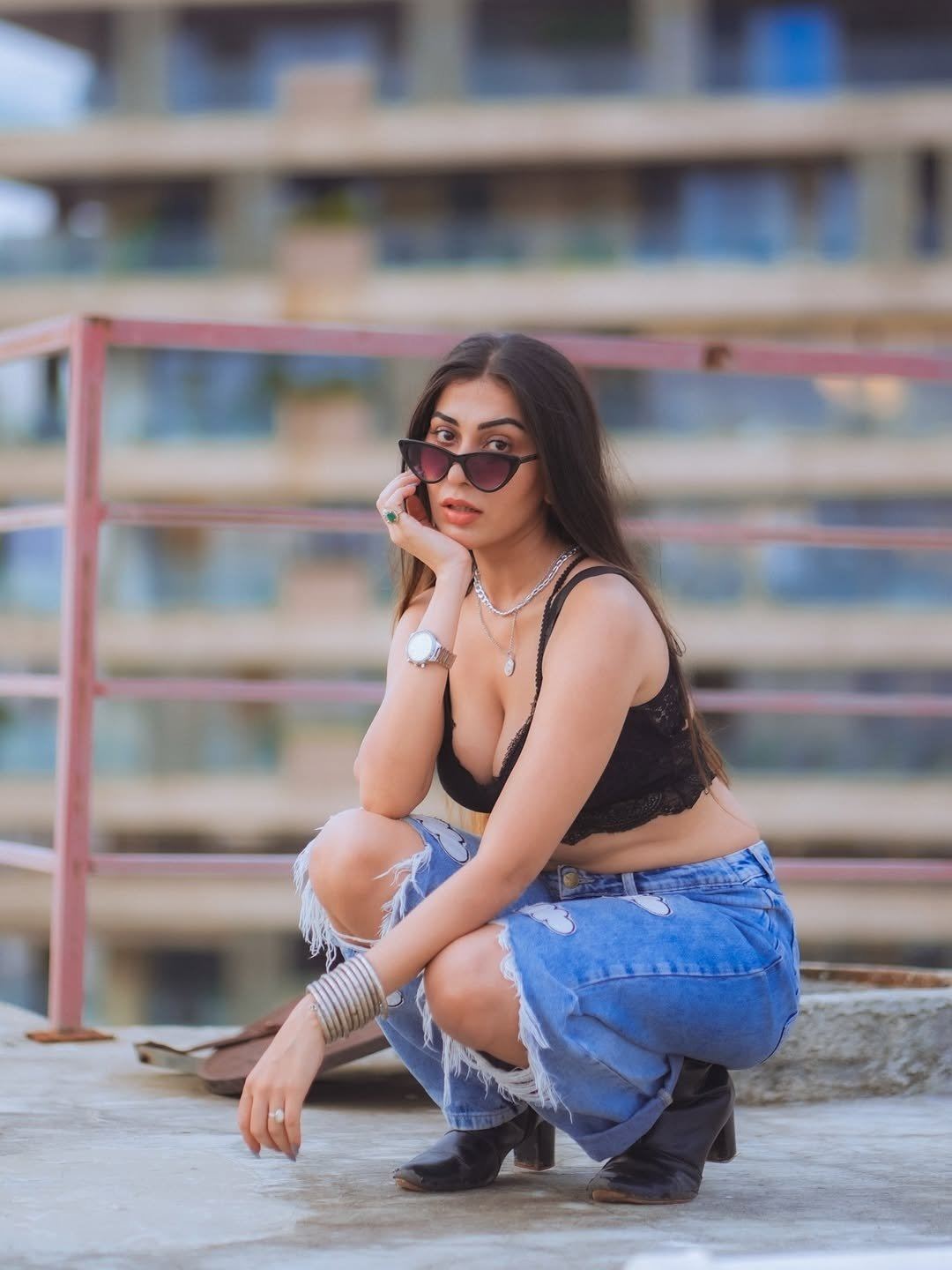 Ruma Sharma Hot Sitting Pose In Ripped Jeans Now