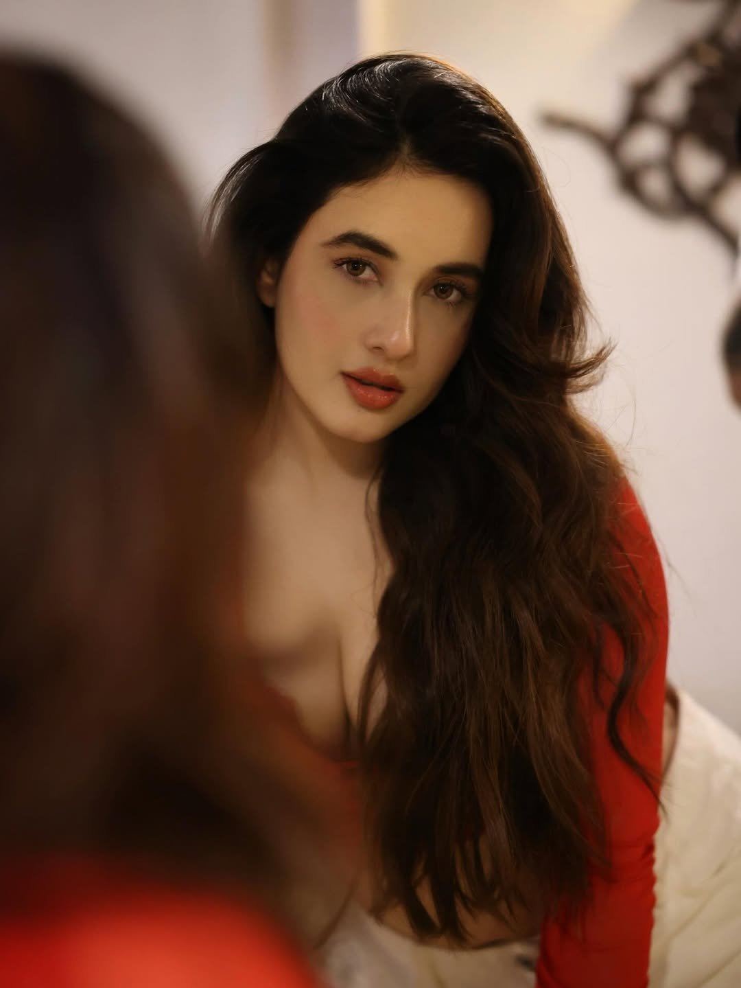 Aditi Budhathoki Poses In Sheer Red Crop Top