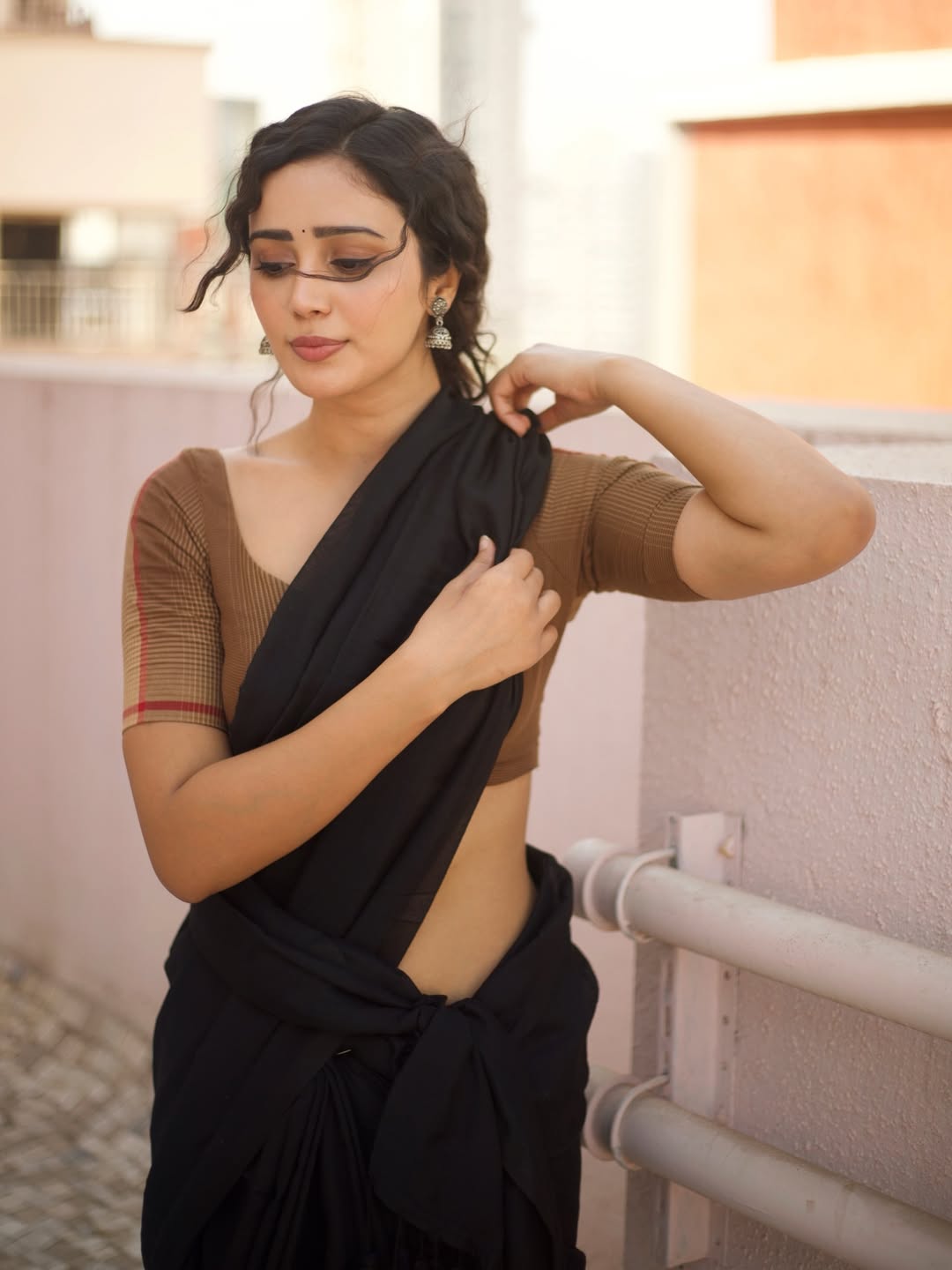 Anaira Gupta Flaunts Her Curves In Rooftop Pose.