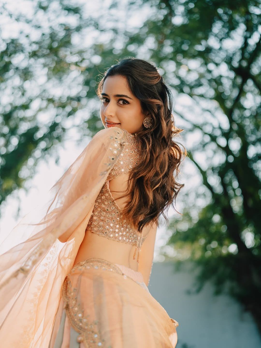 Ashika Ranganath Offering A Playful Side Glance