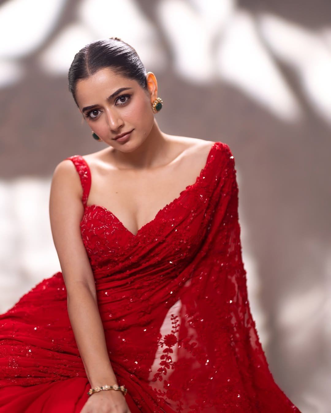 Radiant Expression Of Ashika Rangnath In Red Pic.