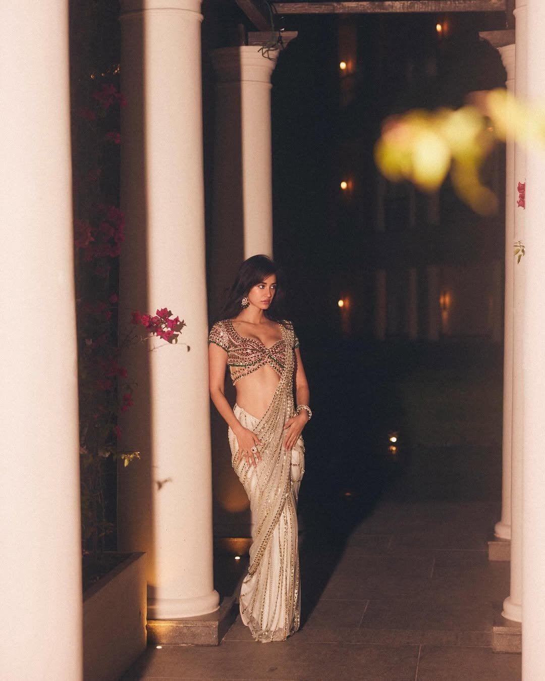 Disha Patani Confident Stance In White Ethnic Fit