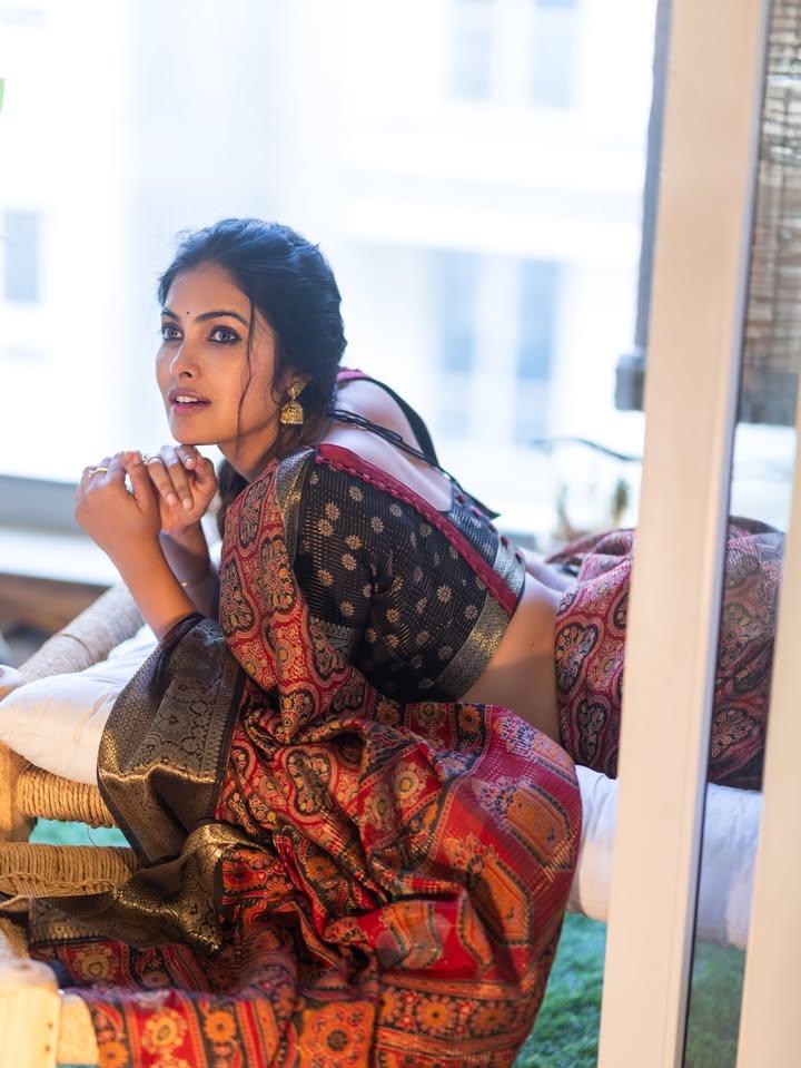 Divi Vadthya Lying On Cot In Saree