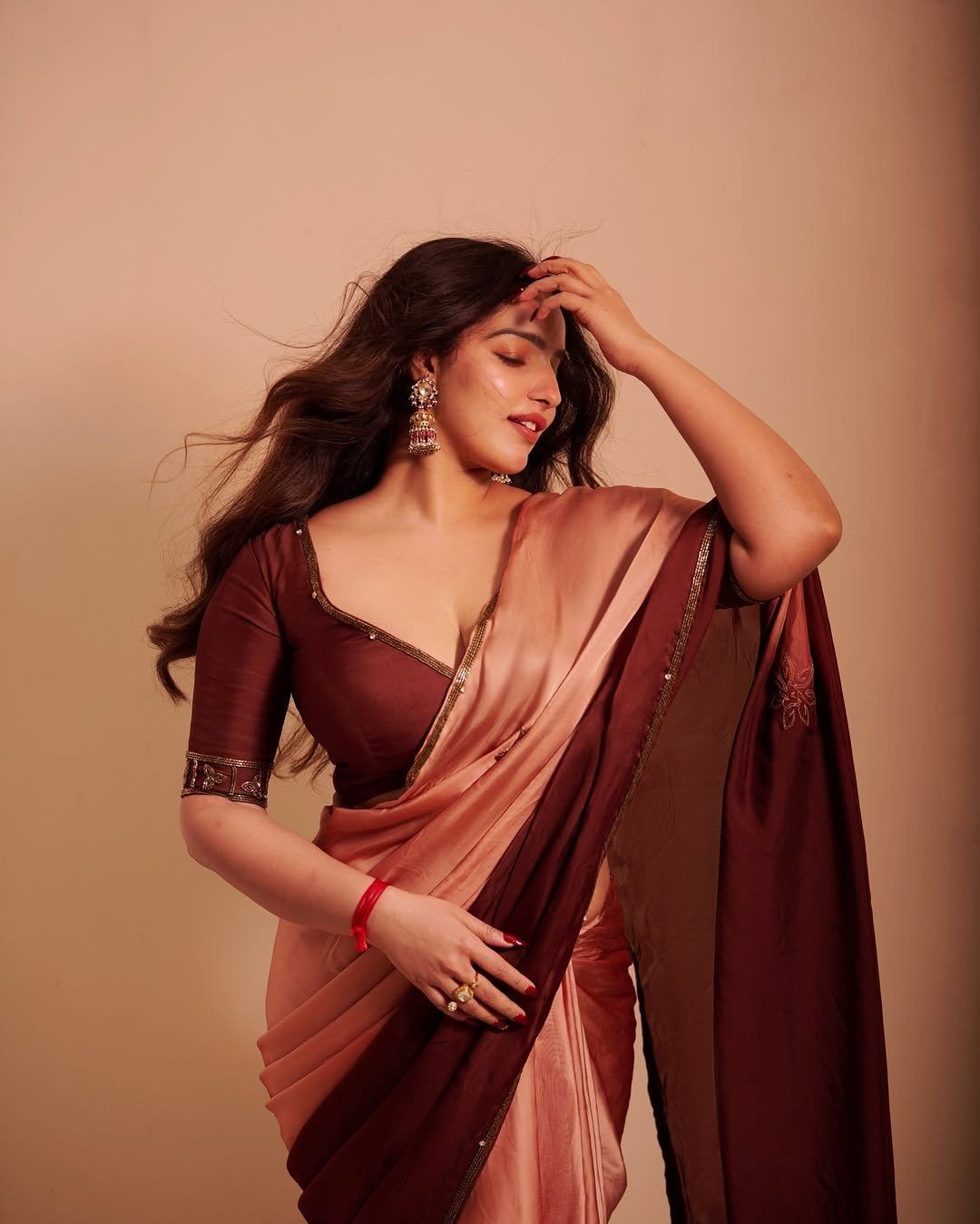 Malavika Menon Stylish Long Wavy Hair Style Image