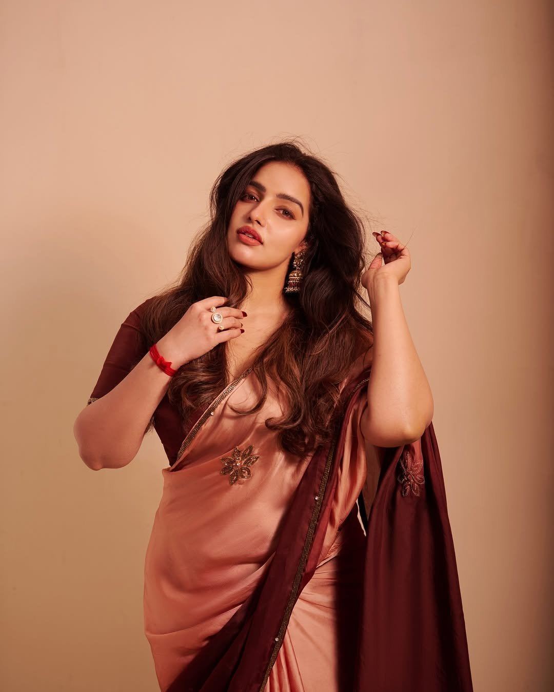 Malavika Menon Hand On Hair Bold Ethnic Pose Look