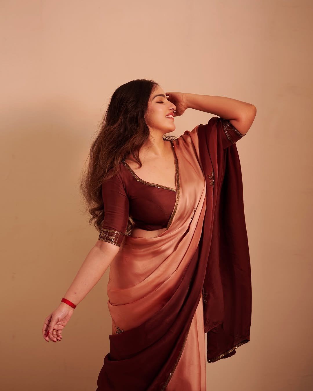 Malavika Menon Trendy Maroon Saree Blouse Design