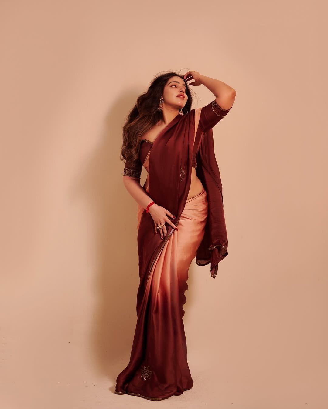 Malavika Menon Posing In Bold Dual Tone Silk Saree