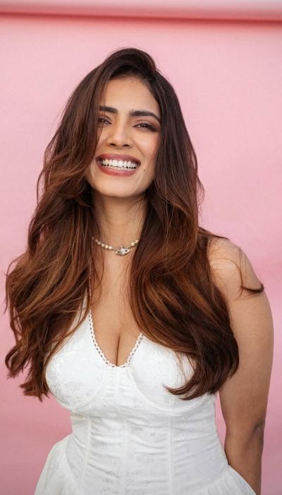 Malavika Mohanan In A Trendy White Corset Dress