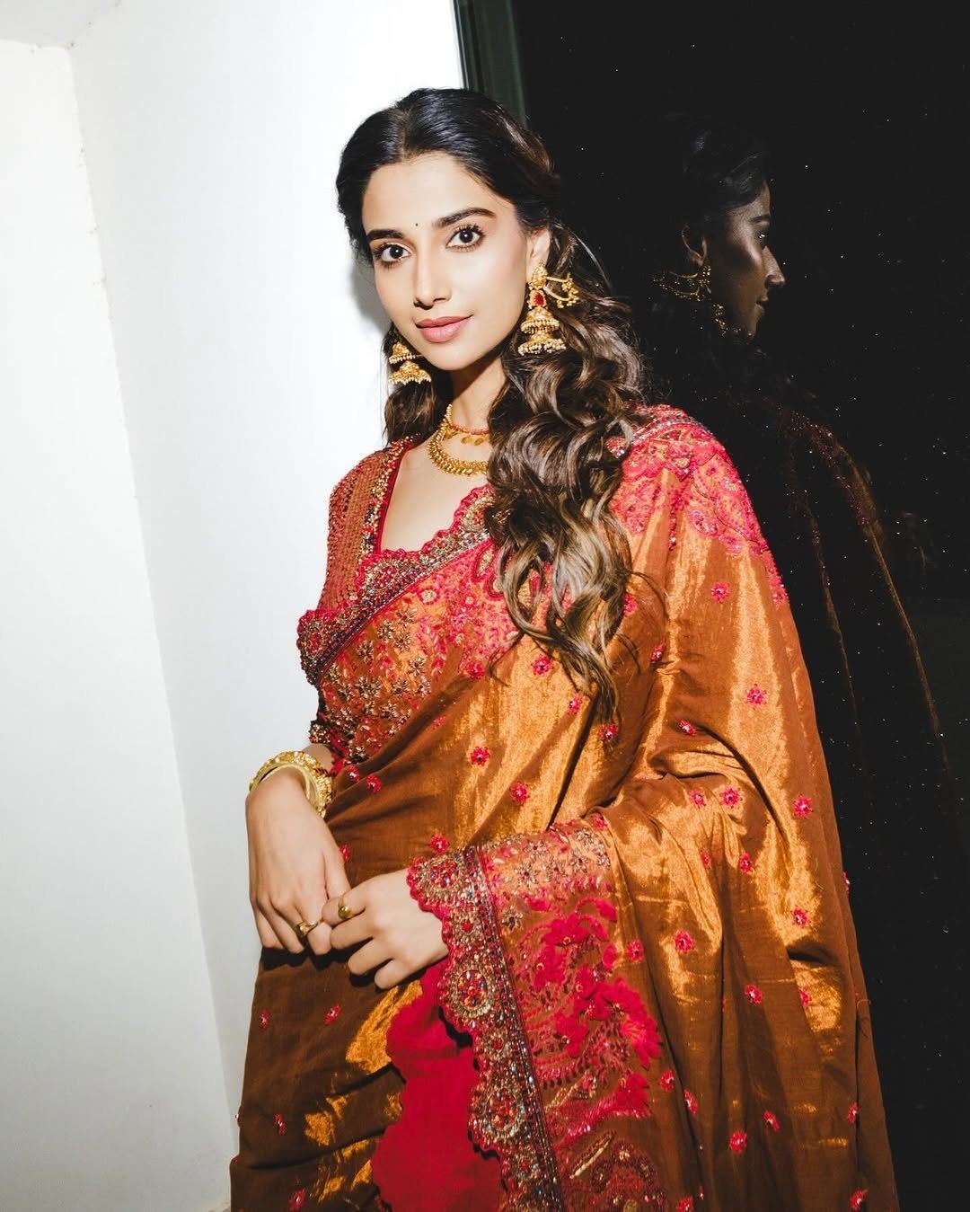 Meenakshi Chaudhary In Traditional Gold Blouse.