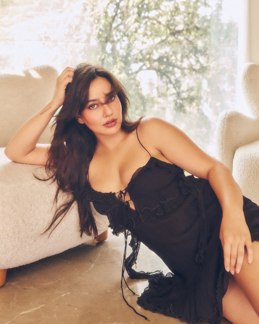 Actress Neha Sharma In A Spicy Black Dress Set.