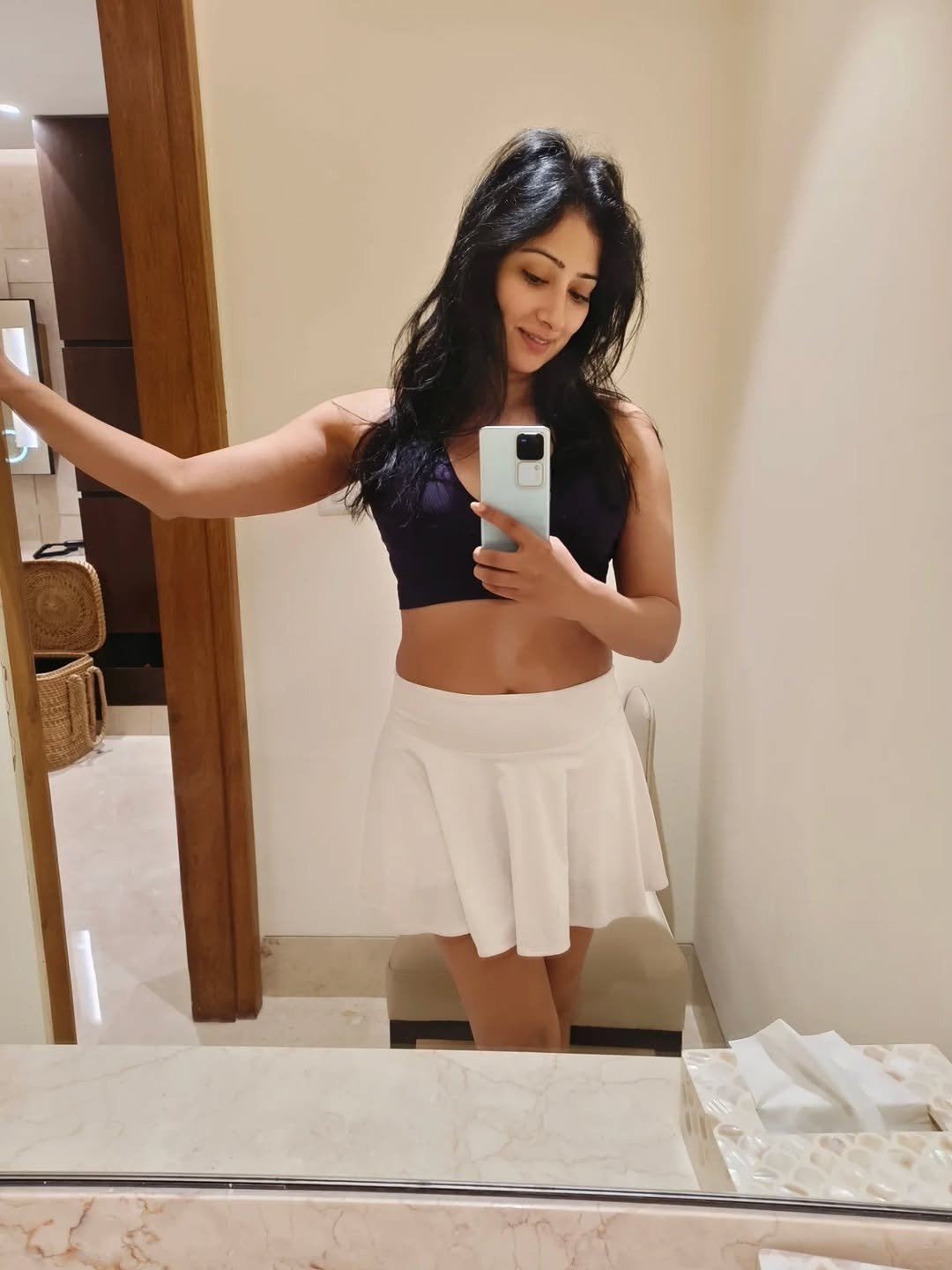 Radiant Smile Of Niharica Raizada In Gym Mirror.